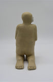 Back profile of second kneeling figure as part of Sally Fitchard's 'Multiple Kneels (Telling)'.