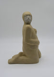 Side profile of second kneeling figure as part of Sally Fitchard's 'Multiple Kneels (Telling)'.