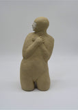 Detail of third kneeling figure as part of Sally Fitchard's 'Multiple Kneels (Telling)'.