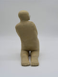Back profile of third kneeling figure as part of Sally Fitchard's 'Multiple Kneels (Telling)'.