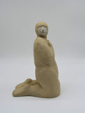 Side profile of third kneeling figure as part of Sally Fitchard's 'Multiple Kneels (Telling)'