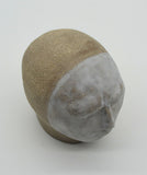 Sally Fitchard's 'Tommy' a small ceramic head with a white face. BIRDSEYE VIEW
