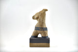 Title: Plinth Woman Artist: Sally Fitchard Medium: clay sculpture Size: 21.5 cm x 11 cm x 7.2 cm (front view). Colour comprises sand and charcoal