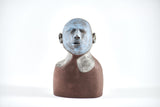 Title: Little Blue Artist: Sally Fitchard Medium: clay sculpture Size: 17.8 cm x 9.7 cm x 6.5 cm (front view). Colours comprise- light blue, terracotta, light grey