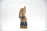 Title: Plinth Man Artist: Sally Fitchard Medium: clay sculpture Size: 14.8 cm x 9.2 cm x 8.4 cm (side profile, left side). Colours comprise sand and charcoal
