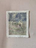 Photograph of Lauren Bryden's 'Running Down The Hill' mounted on the wall. Unframed. 