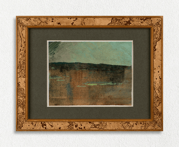 Framed abstract artwork with a wooden frame on a white wall