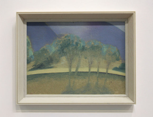 Framed painting of a landscape with trees and a blue sky.