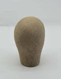 Sally Fitchard's 'Mottle'. A small ceramic head with a mottled face. BACK PROFILE