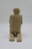 Back profile of second kneeling figure as part of Sally Fitchard's 'Multiple Kneels (Telling)'. 