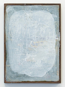 Abstract painting with a textured surface in a wooden frame