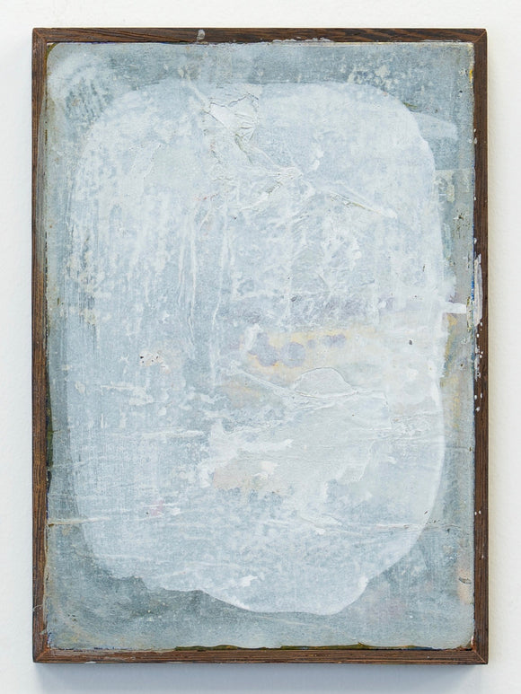 Abstract painting with a textured surface in a wooden frame