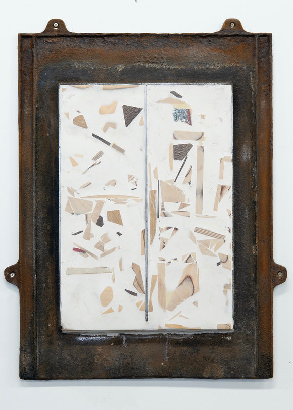 Abstract artwork with geometric shapes in an old metal window frame on a white background