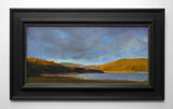 Andrew Sinclair's 'Illuminated Laudale' is an oil painting of a Highland Landscape. It comes framed in a black wooden frame.