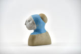 Title: Angelic Artist: Sally Fitchard Medium: clay bust sculpture Size: 13.5 cm x 11.6 cm x 7.4 cm (side I)