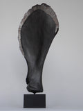 Title: Black Bone Artist: Lucy Gray Medium: silverleaf, pigmented jesmonite Size: 77 H x 30 W x 30 D cm (back)