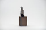 Title: Damage in a Bottle Artist: Sally Fitchard Medium: clay sculpture Size: 18.5 cm x 7.5 cm x 7.5 cm (FRONT)