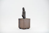 Title: Damage in a Bottle Artist: Sally Fitchard Medium: clay sculpture Size: 18.5 cm x 7.5 cm x 7.5 cm (PROFILE)