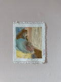 Photograph of Lauren Bryden's 'Dot on the Couch' mounted on the wall. Unframed.