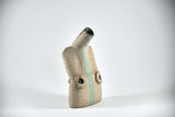 Title: Figure Vessel Artist: Sally Fitchard Medium: clay sculpture Size: 17.8 cm x 9.7 cm x 6.5 cm (side-profile, right side). Colours comprise- natural, black, lichen green