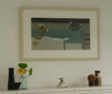 A photo of Fiona MacRae's 'Mustard Jelly Mackerel' in situ. The artwork is framed in a wooden frame that is painted in a shade of stone. It is mounted in white and set behind glass