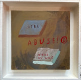 Photograph of Sarah J. Stanley's 'Abuse Lol Ochre' in a white, floating frame. 